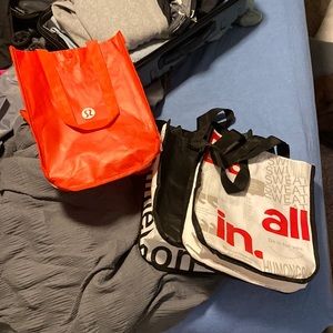 3 small lulu lemon hand bags